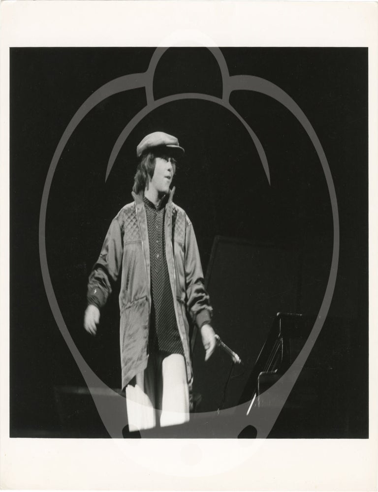 Collection of thirteen original photographs of Elton John, circa 1970s