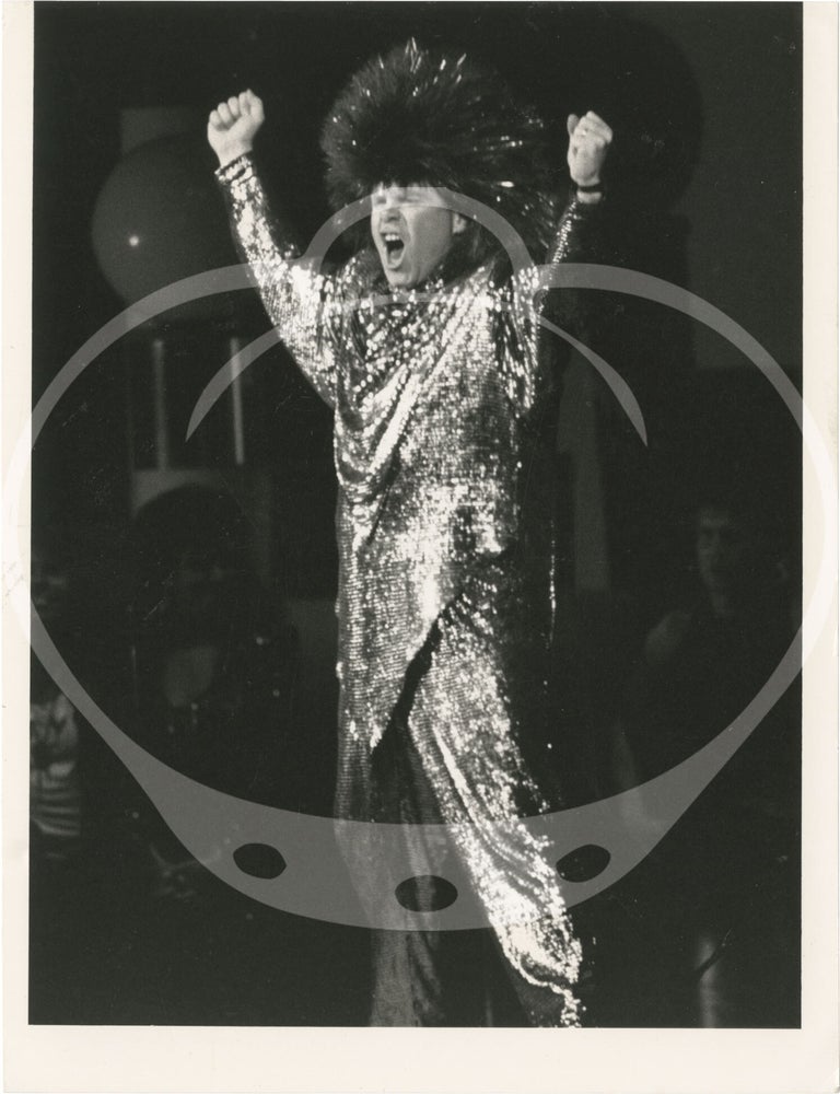 Collection of thirteen original photographs of Elton John, circa 1970s