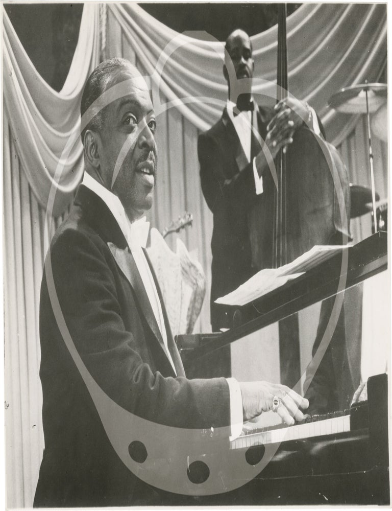 Collection of 13 original photographs of Count Basie