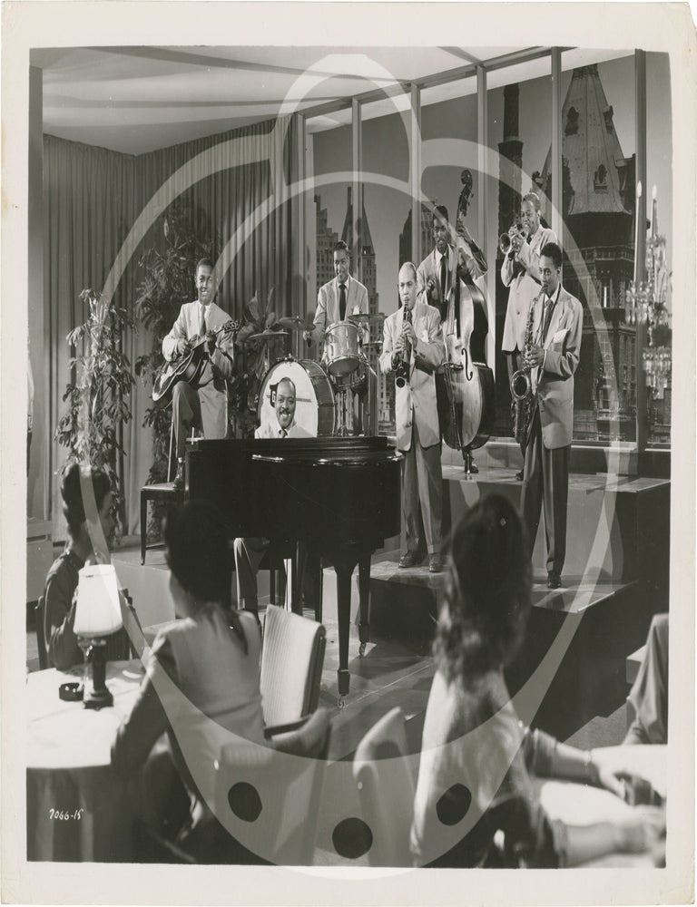 Collection of 13 original photographs of Count Basie