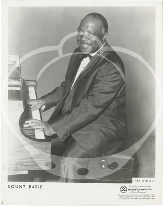 Collection of thirteen original photographs of Count Basie