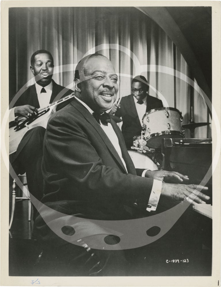 Collection of 13 original photographs of Count Basie