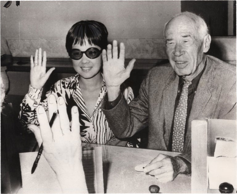 Book #156323] Original photograph of Henry Miller and Hoki Tokuda applying for a marriage...