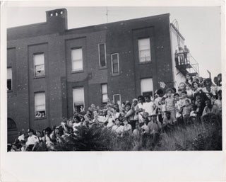 Book #156693] Original photograph of crowds waving to Robert Kennedy along the campaign route in...