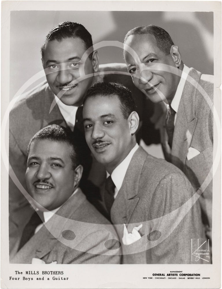 Eight original photographs of The Mills Brothers