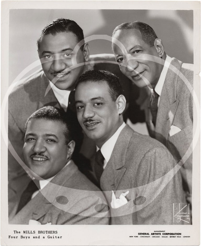 Eight original photographs of The Mills Brothers