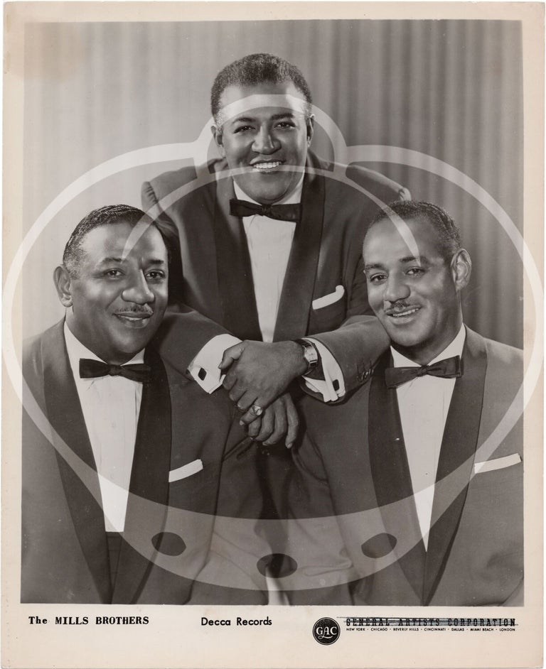 Eight original photographs of The Mills Brothers