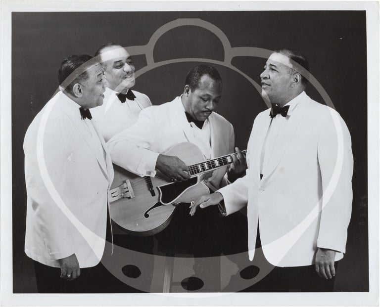 Eight original photographs of The Mills Brothers