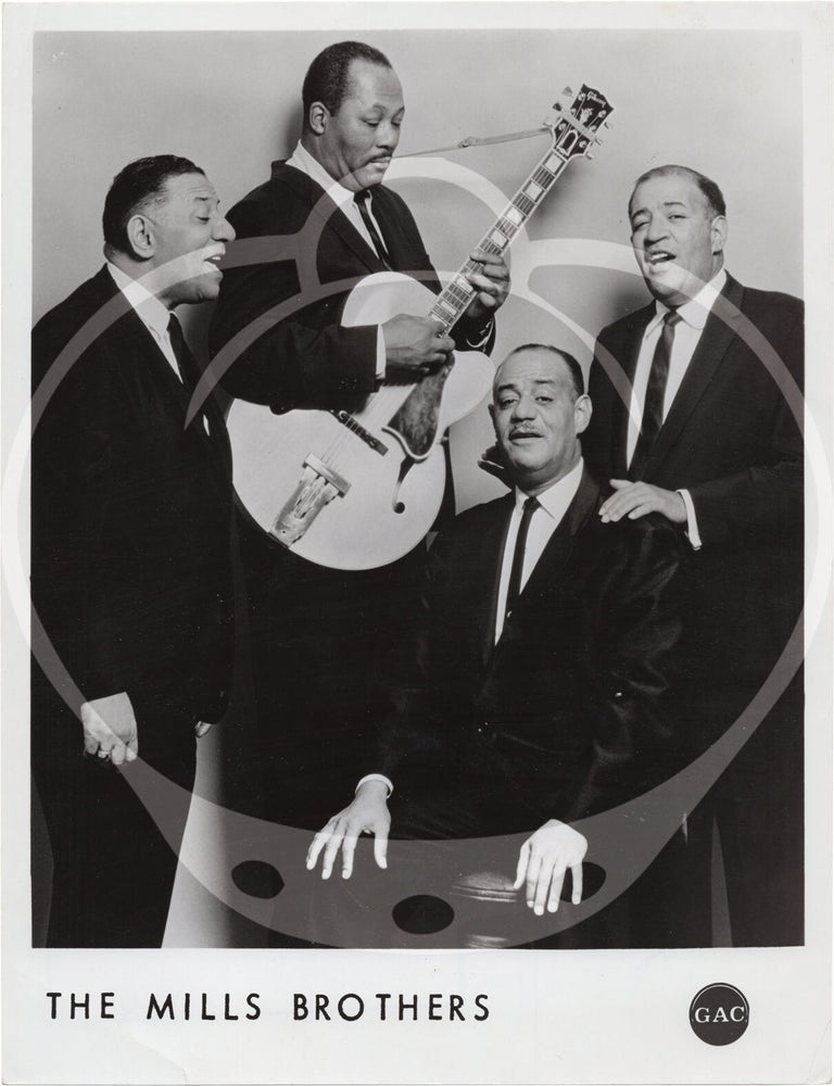Eight original photographs of The Mills Brothers