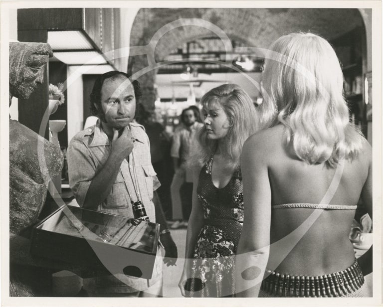 Archive of material belonging to sexploitation director and producer Don Schain, including 16 original screenplays, 80 set photographs, legal correspondence, fan mail, and production documents