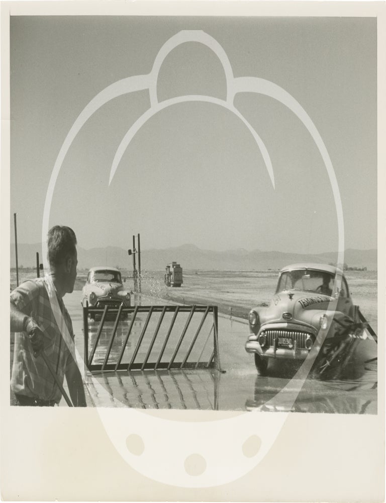 Archive of fifteen original photographs of automobile tire testing by the US Rubber Company, circa 1950s
