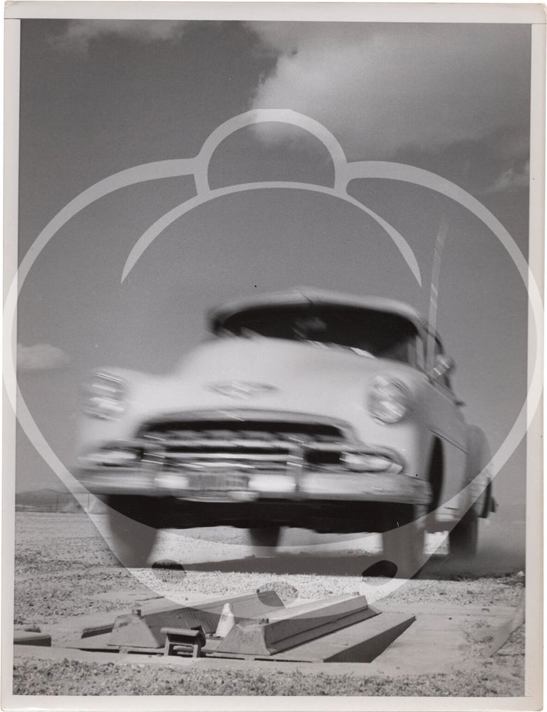 Archive of fifteen original photographs of automobile tire testing by the US Rubber Company, circa 1950s