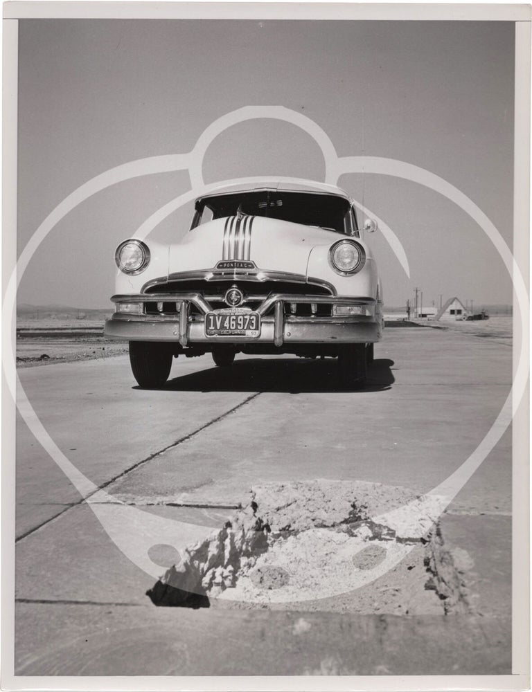 Archive of fifteen original photographs of automobile tire testing by the US Rubber Company, circa 1950s