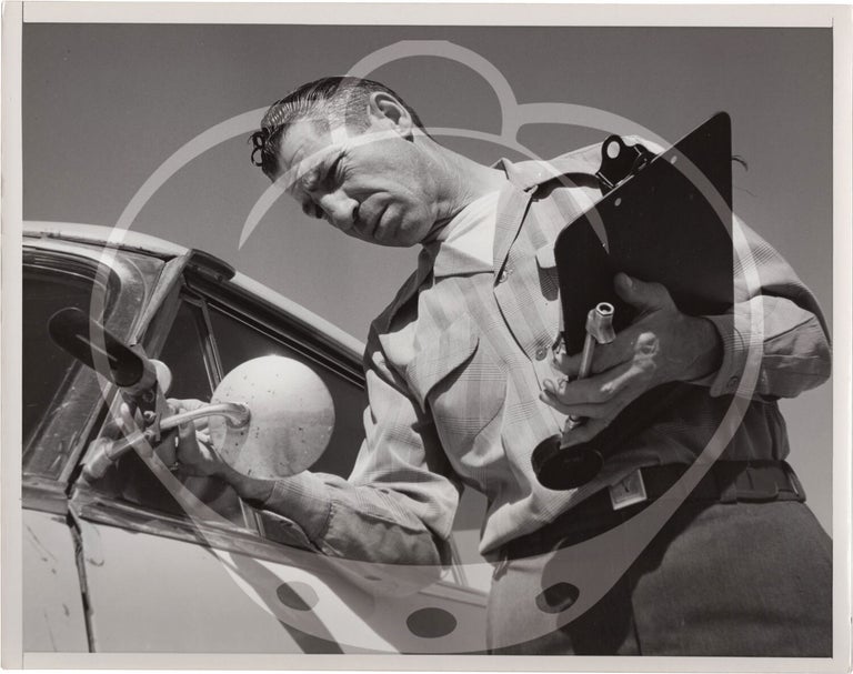 Archive of fifteen original photographs of automobile tire testing by the US Rubber Company, circa 1950s