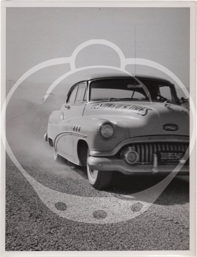 Archive of fifteen original photographs of automobile tire testing by the US Rubber Company, circa 1950s