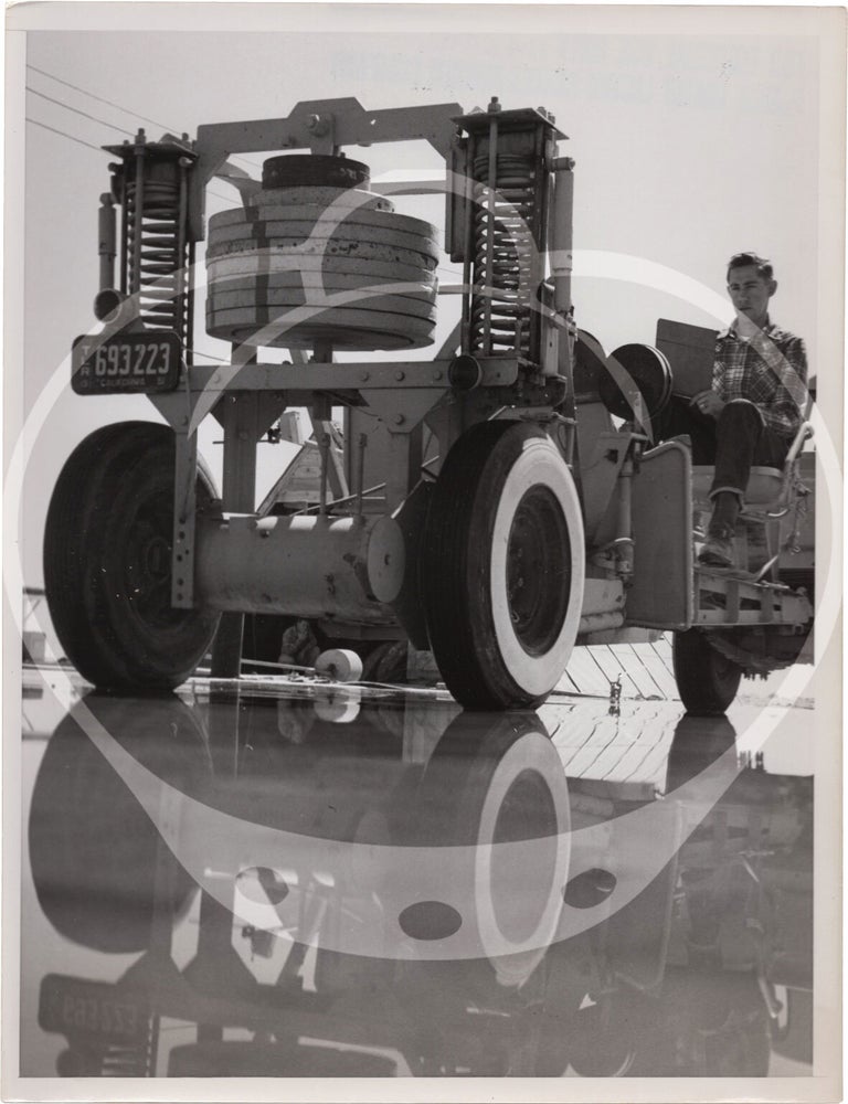 Archive of fifteen original photographs of automobile tire testing by the US Rubber Company, circa 1950s
