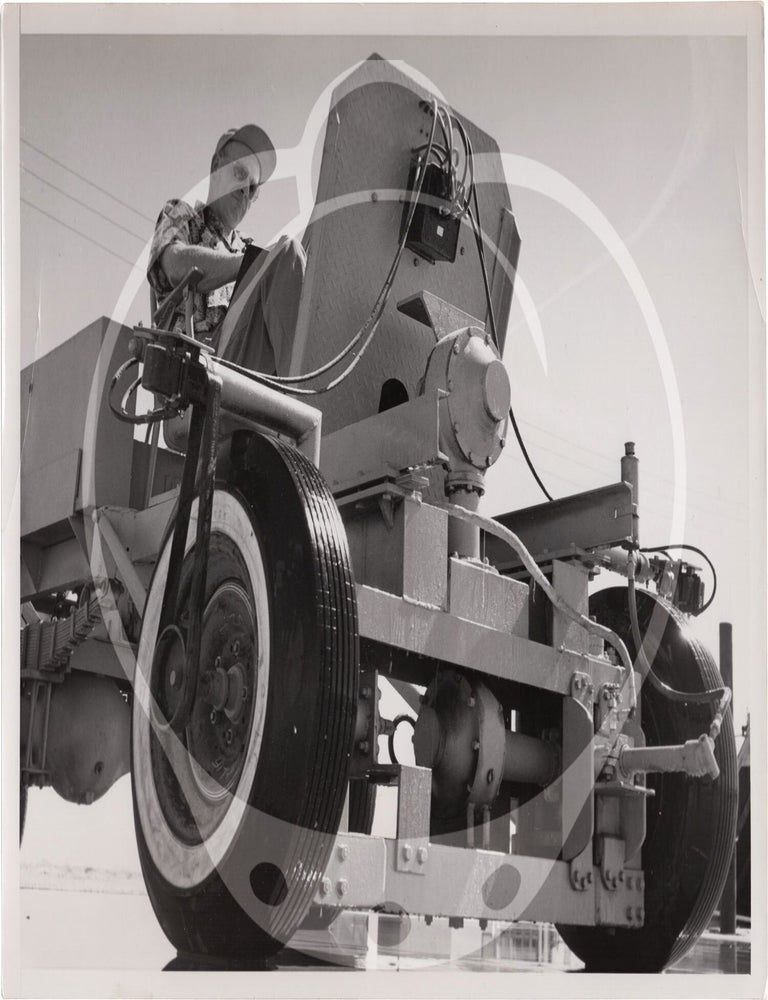 Archive of fifteen original photographs of automobile tire testing by the US Rubber Company, circa 1950s