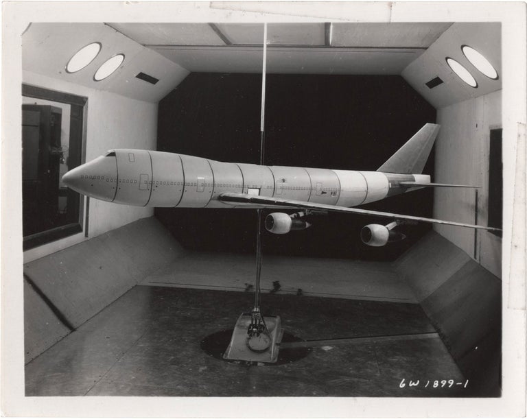 [Book #157128] Archive of 46 original vernacular photographs of a model airliner in wind tunnel tests. Transportation, Airplanes.