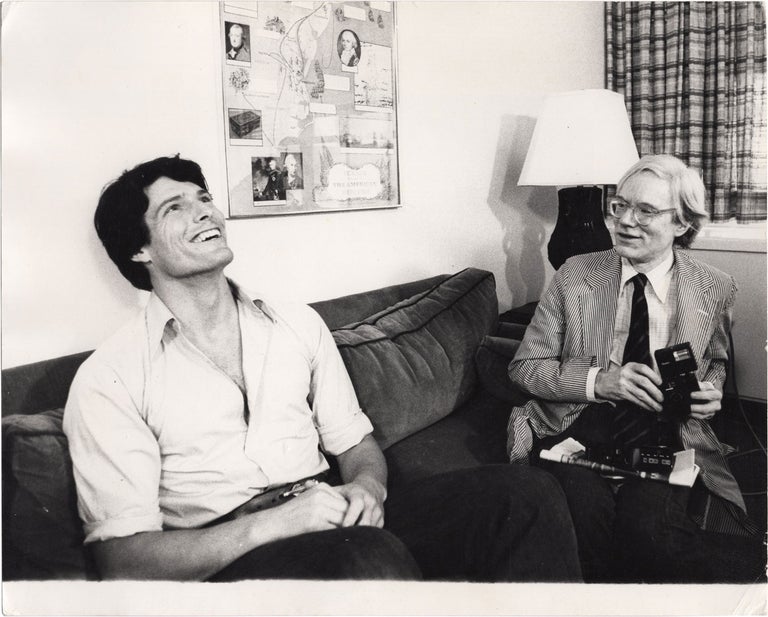 [Book #157248] Two original photographs of Andy Warhol interviewing Christopher Reeve. Christopher Reeve Andy Warhol, Christopher Makos, subjects, photographer.