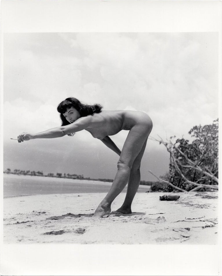 [Book #157641] Original photograph of Bettie Page on the beach, 1954. Bettie Page, Bunny Yeager, subject, photographer.