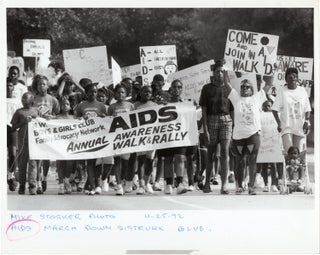 Book #158048] Archive of 31 South Florida press photographs regarding the AIDS crisis, 1985-1993....
