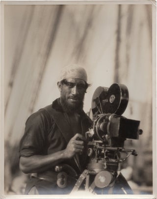 Book #158557] Original photograph of an African American cameraman, circa 1930s. Hollywood,...