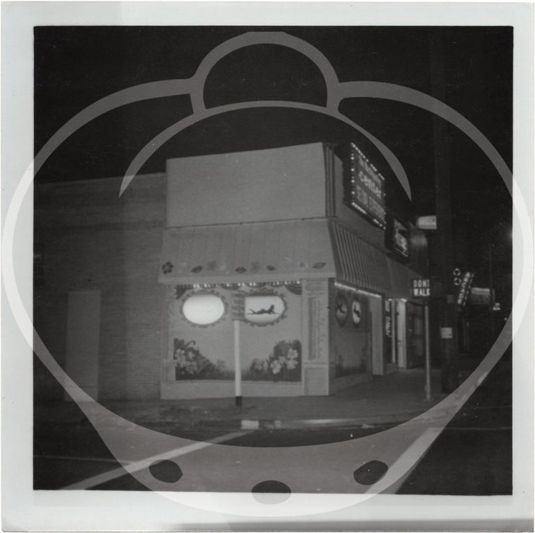 Archive of 117 original evidence photographs documenting Los Angeles massage parlors, circa 1970s