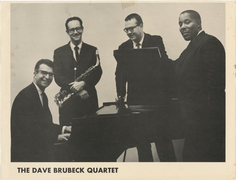 [Book #159905] Original oversize photograph of The Dave Brubeck Quartet, circa 1960. The Dave Brubeck Quartet, Paul Desmond Dave Brubeck, Joe Morello, Eugene Wright, subjects.