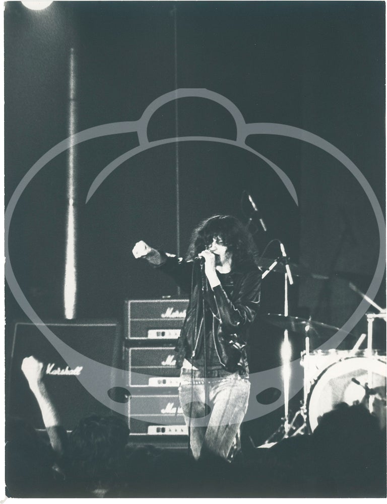 Three original photographs of the Ramones in concert in Paris, 1977