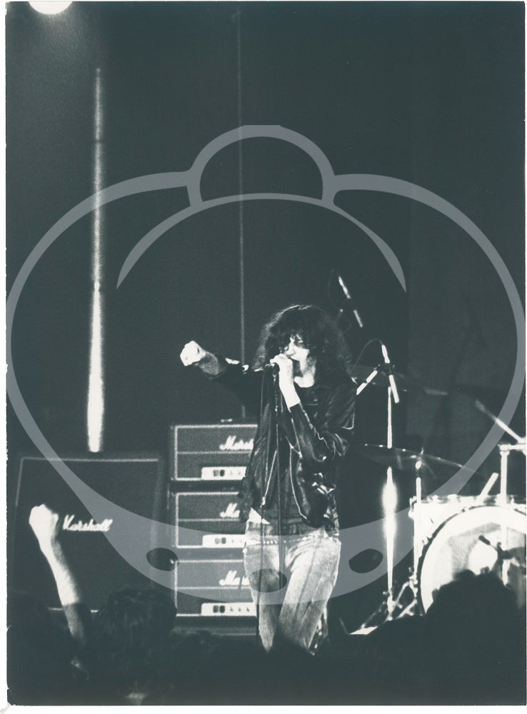 Three original photographs of the Ramones in concert in Paris, 1977