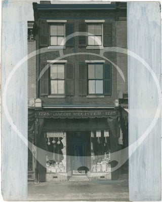 Collection of twelve touched-up photographs of Philadelphia business storefronts, circa 1920