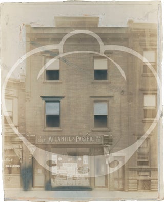Collection of twelve touched-up photographs of Philadelphia business storefronts, circa 1920