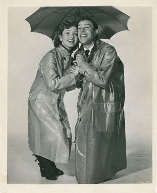 Book #160531] Singin' in the Rain (Original photograph from the 1952 film). Gene Kelly, Stanley...