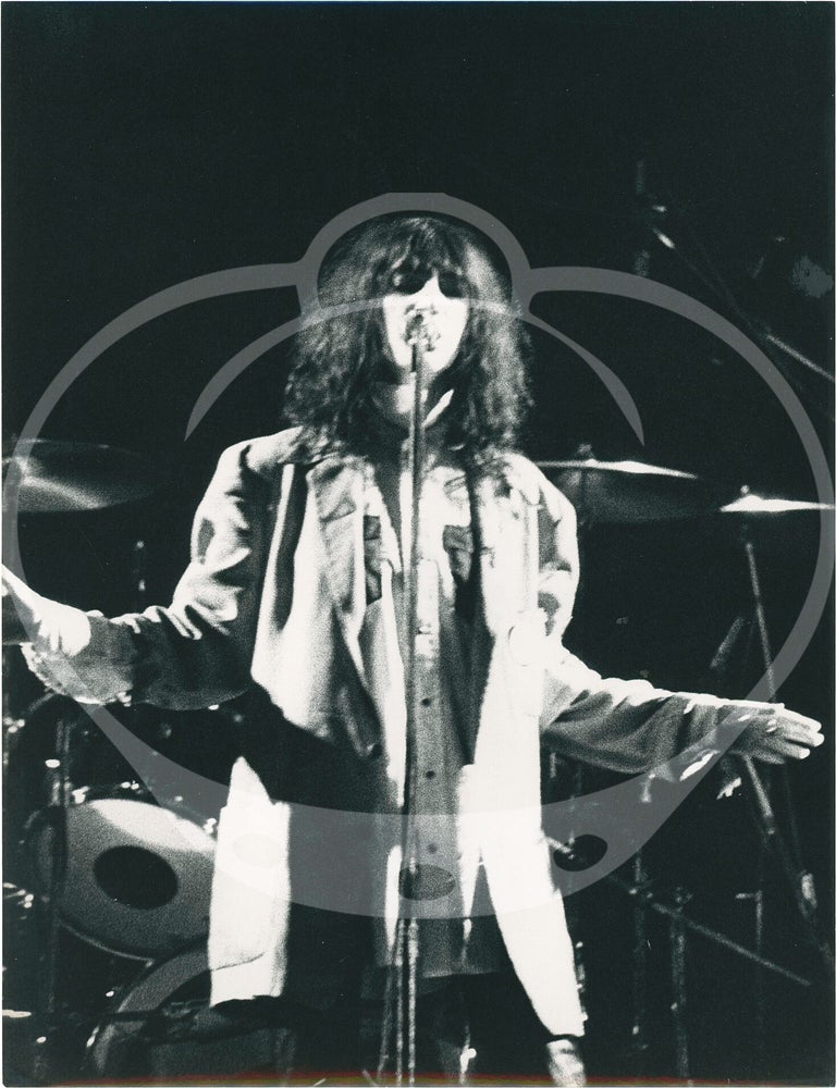 Two original photographs of Patti Smith onstage in Paris, 1978