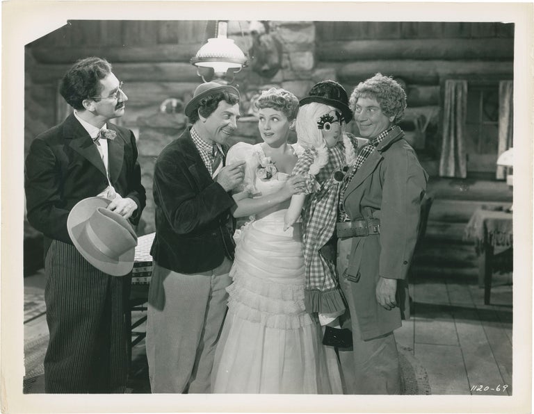 Book #161131] Go West (Collection of five original photographs from the 1940 film). Chico Marx...