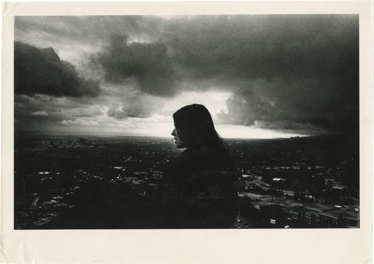 Book #161158] Original oversize photograph of Barbara Hershey looking out over the Los Angeles...