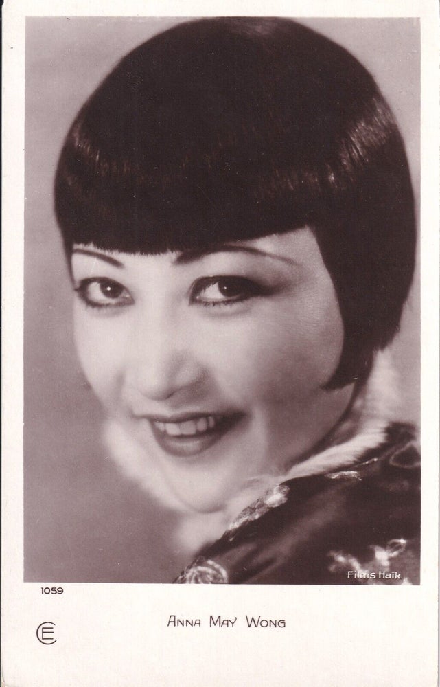 Book #161299] Original postcard photograph of actress Anna May Wong, circa 1940s. Anna May Wong,...