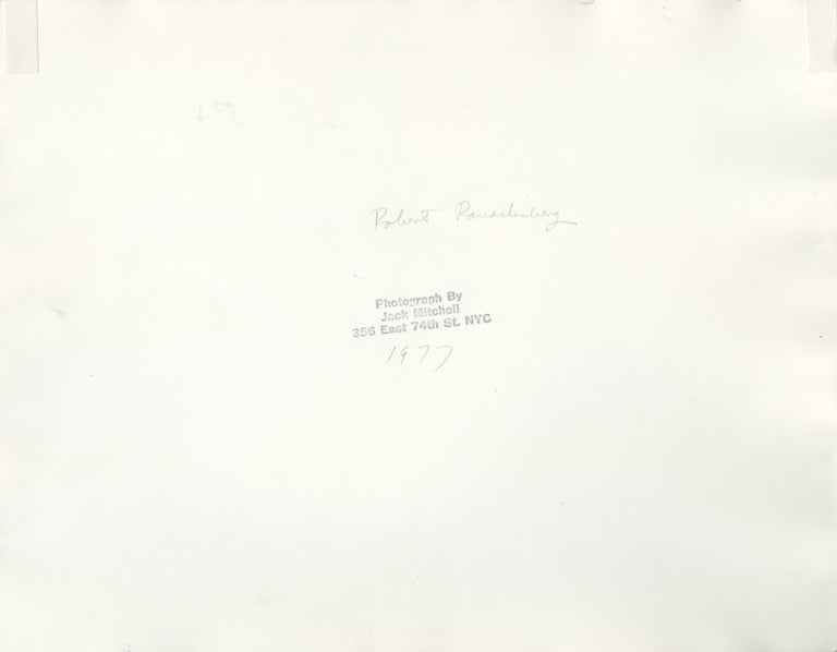 Original oversize portrait photograph of Robert Rauschenberg in his studio, 1977