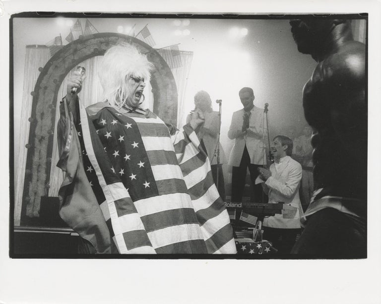 Four original photographs of Divine in performance at the Hippodrome, 1985-1987