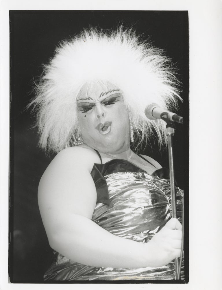 Four original photographs of Divine in performance at the Hippodrome, 1985-1987