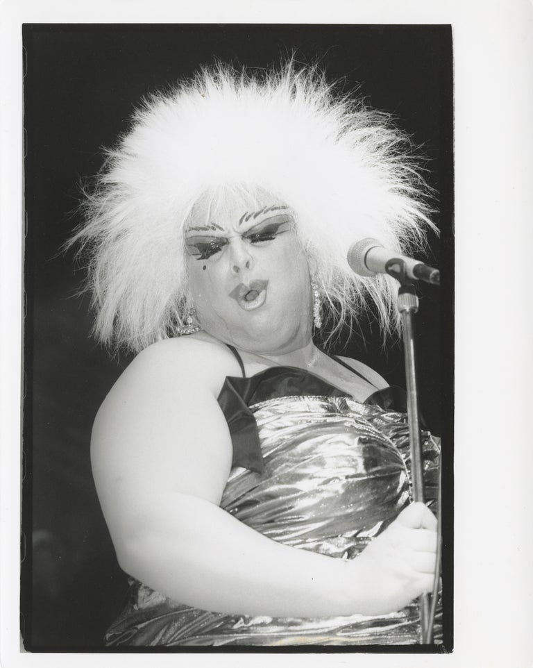 Four original photographs of Divine in performance at the Hippodrome, 1985-1987