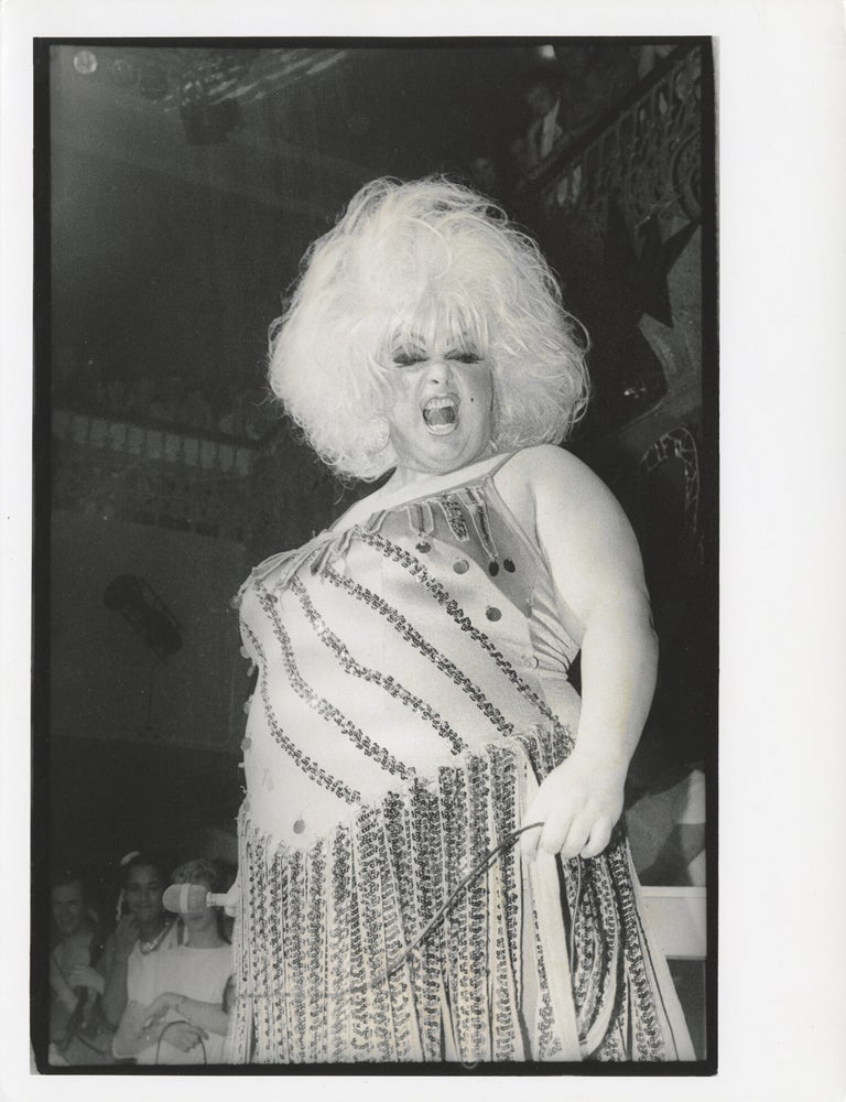 Four original photographs of Divine in performance at the Hippodrome, 1985-1987