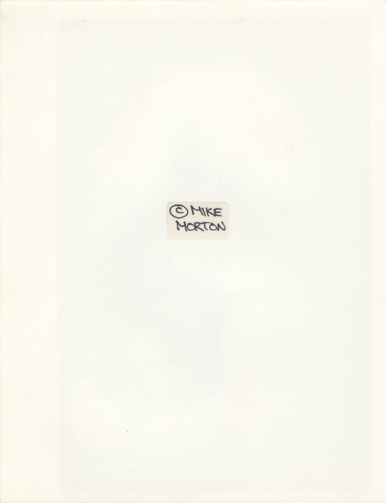 Four original photographs of Divine in performance at the Hippodrome, 1985-1987