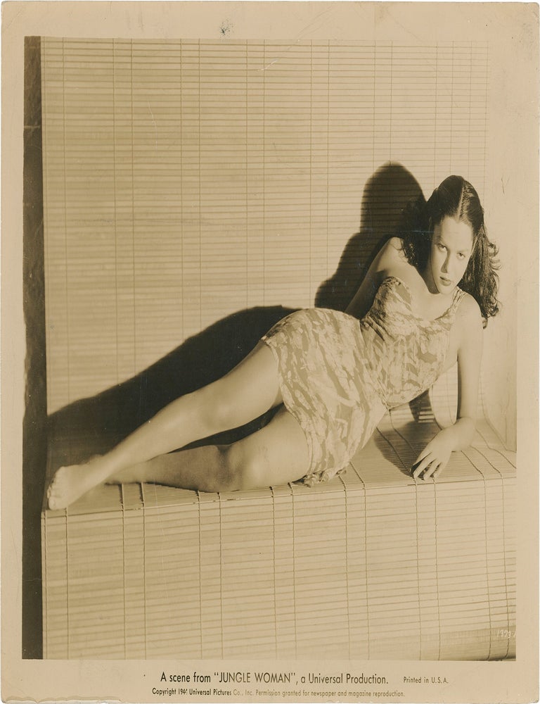Collection of 13 original publicity photographs of Acquanetta, one inscribed by the actress on the verso