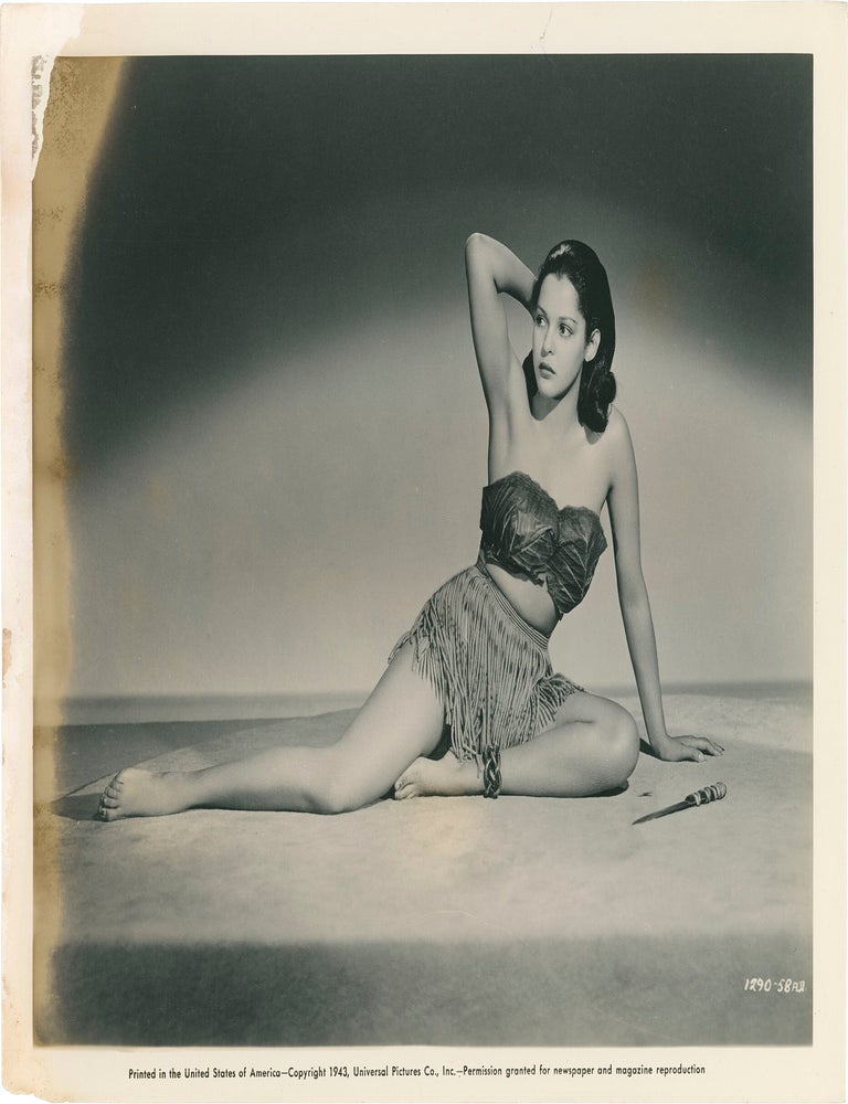 Collection of 13 original publicity photographs of Acquanetta, one inscribed by the actress on the verso