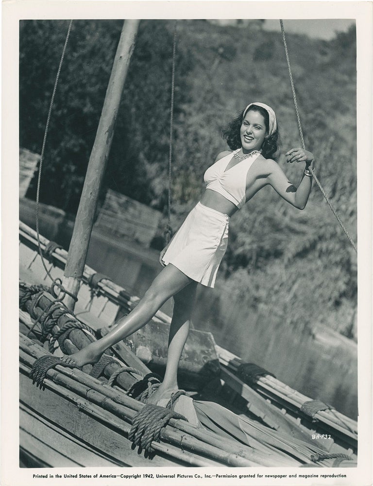 Collection of 13 original publicity photographs of Acquanetta, one inscribed by the actress on the verso