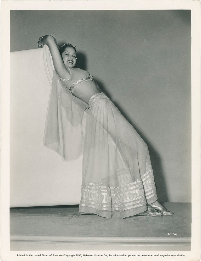 Collection of 13 original publicity photographs of Acquanetta, one inscribed by the actress on the verso