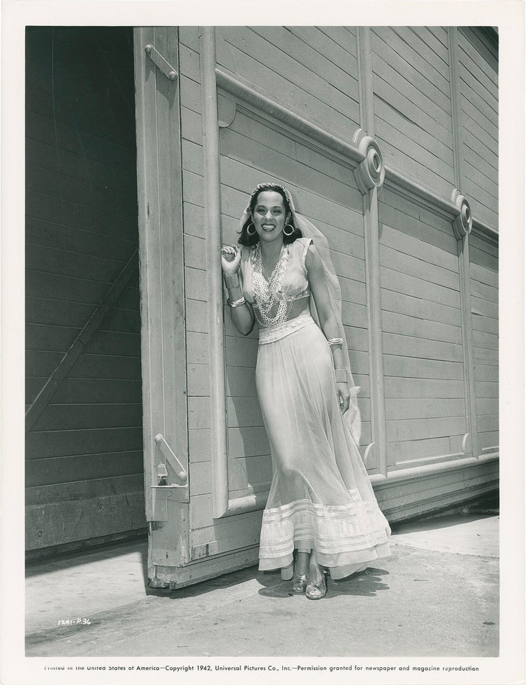 Collection of 13 original publicity photographs of Acquanetta, one inscribed by the actress on the verso
