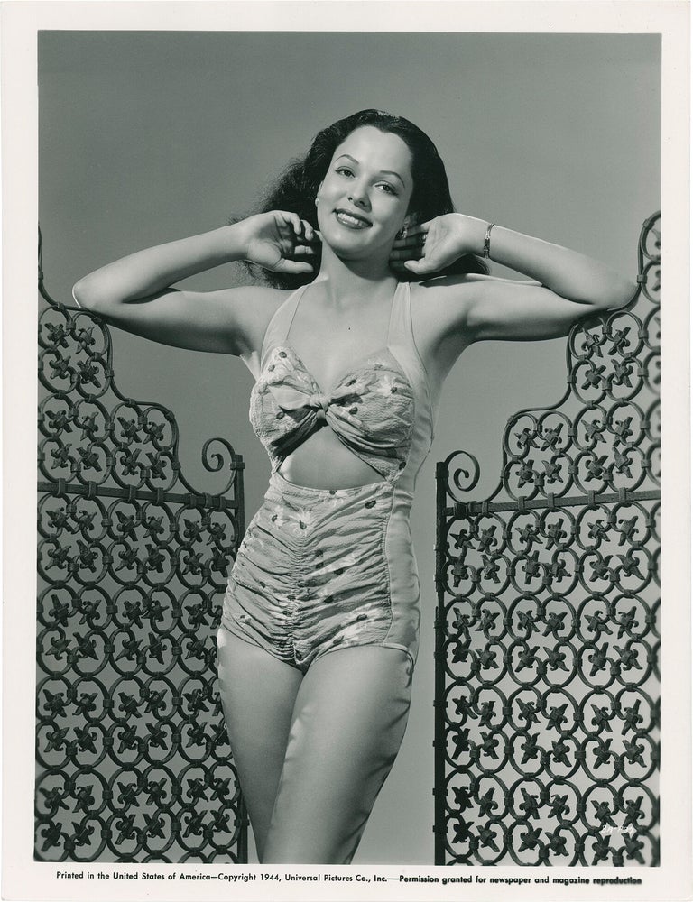 Collection of 13 original publicity photographs of Acquanetta, one inscribed by the actress on the verso