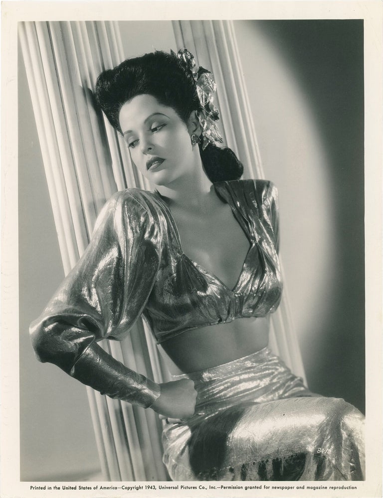 Collection of 13 original publicity photographs of Acquanetta, one inscribed by the actress on the verso